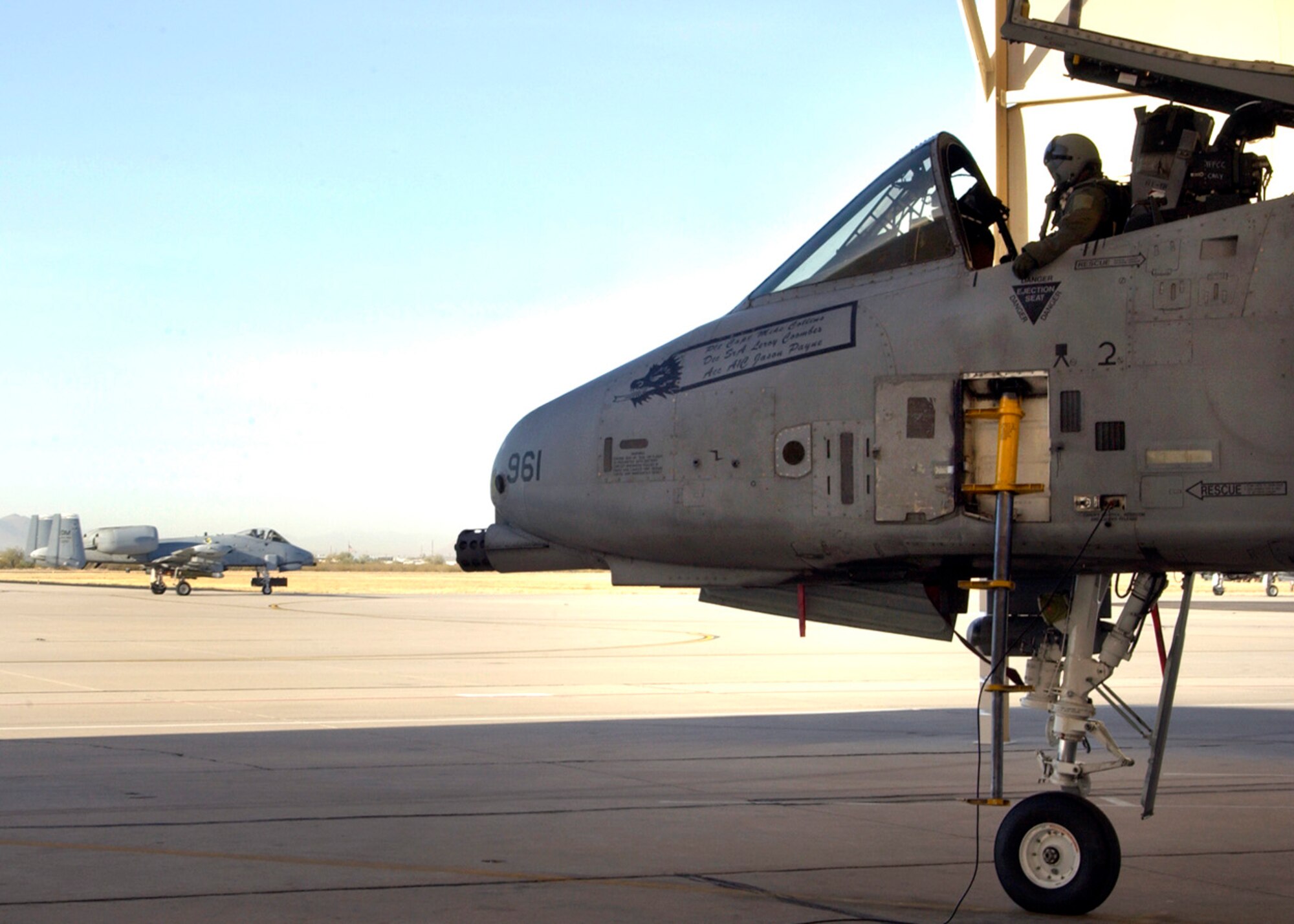 DAVIS-MONTHAN AIR FORCE BASE, Ariz. (AFPN) -- Capt. Scott Michalowski does a preflight inspection before takeoff. The 357th Fighter Squadron continuously trains for real world deployment situations. Captain Michalowski is a pilot with the 357th FS. (U.S. Air Force photo by Airman 1st Class Veronica Pierce)
