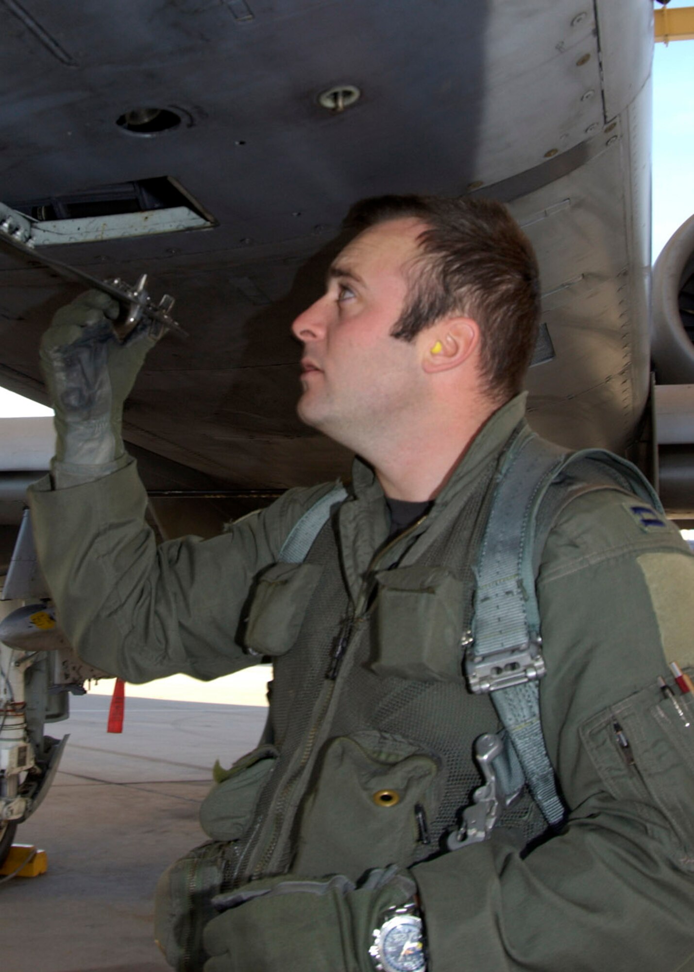 DAVIS-MONTHAN AIR FORCE BASE, Ariz. (AFPN) -- Capt. Scott Michalowski does a preflight inspection before takeoff. The 357th Fighter Squadron continuously trains for real world deployment situations. Captain Michalowski is a pilot with the 357th FS. (U.S. Air Force photo by Airman 1st Class Veronica Pierce)