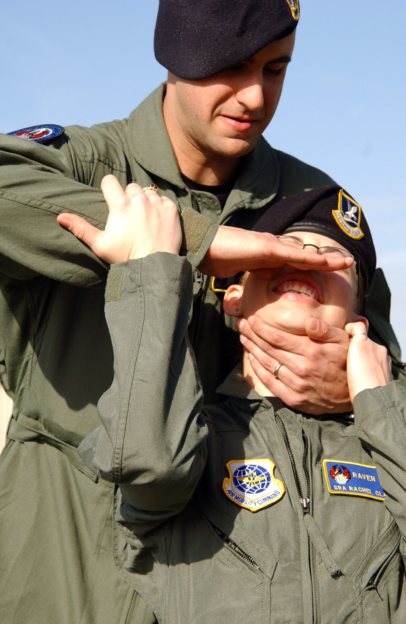 MACDILL AIR FORCE BASE, Fla. (AFPN) -- Airman 1st Class Joseph Jones applies the infra-orbital pressure point to Senior Airman Rachel Claire Jan. 11. The Airmen are with the 6th Security Forces Squadron's Phoenix Ravens. Ravens are specially trained to detect, deter and counter threats with the least amount of force necessary. (U.S. Air Force photo by Senior Airman Jason Robertson)