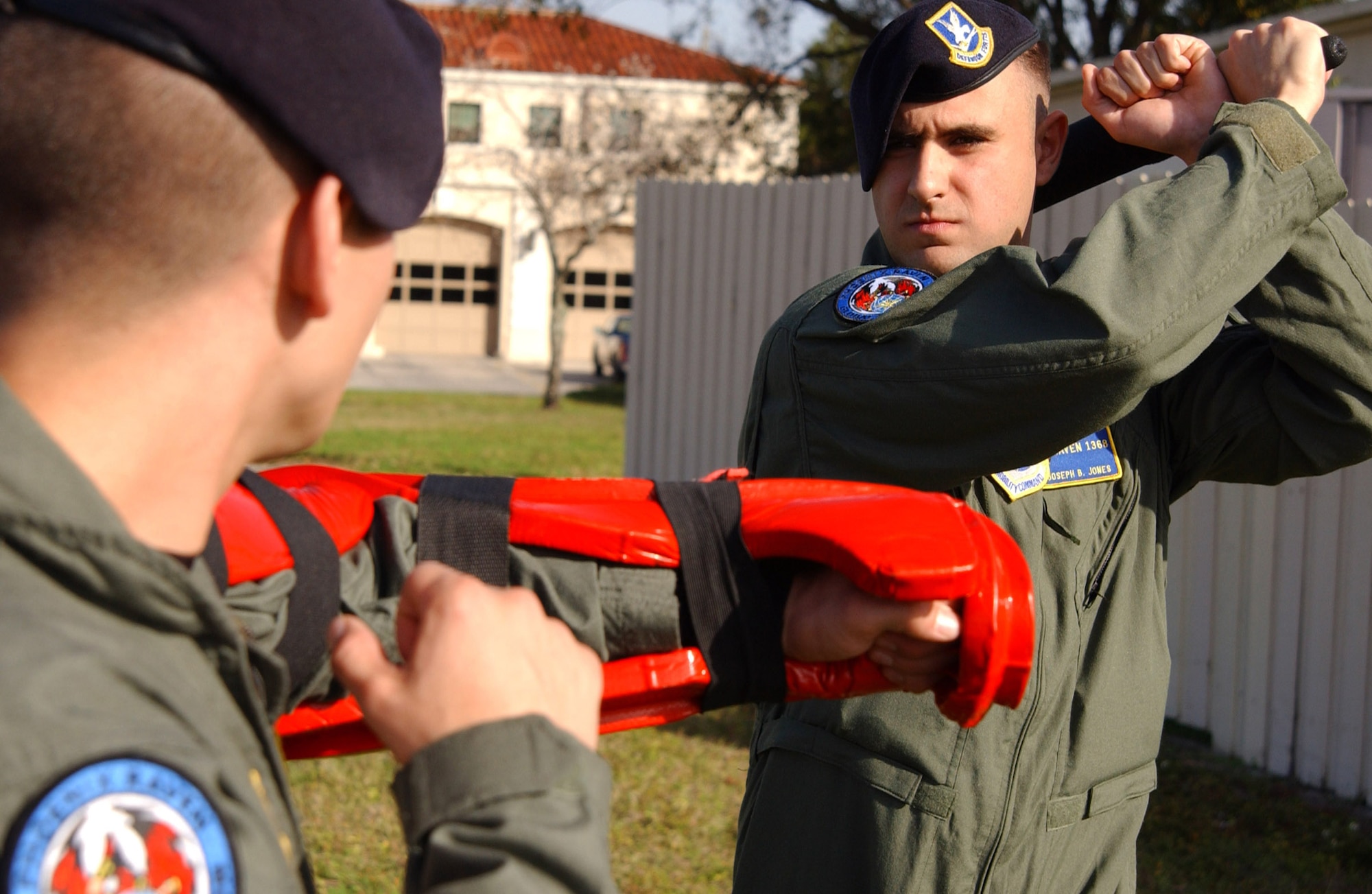 MACDILL AIR FORCE BASE, Fla. (AFPN) -- Airman 1st Class Joseph Jones (right) and Senior Airman William Lepionka do tactical baton training Jan. 11. The Airmen are with the 6th Security Forces Squadron's Phoenix Ravens. Ravens are specially trained to detect, deter and counter threats with the least amount of force necessary. (U.S. Air Force photo by Senior Airman Jason Robertson)