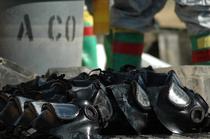 SUFFIELD, CANADA--M-40 field protective masks dry in the sun after being decontaminated by Decontamination Team, Company A, Chemical Biological Incident Response Force, II Marine Expeditionary Force, following a live chemical-warfare agent training evolution, Sept. 13.  All personal protective equipment, including the mask, is required to be thoroughly decontaminated to avoid cross-contamination.