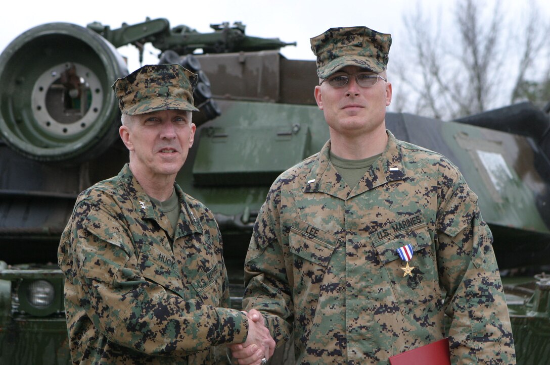 MARINE CORPS BASE CAMP LEJEUNE, N.C.- 1st Lt. Jeffery T. Lee, from Pacolet Mills, S.C., received the Silver Star Medal from Maj. Gen. Richard A. Huck, commanding general of 2nd Marine Division here March 14. Lee was a platoon commander with Company A, 2nd Tank Battalion in support of Operation Iraqi Freedom and was awarded for his actions from Nov. 8 to Nov. 11, 2004.