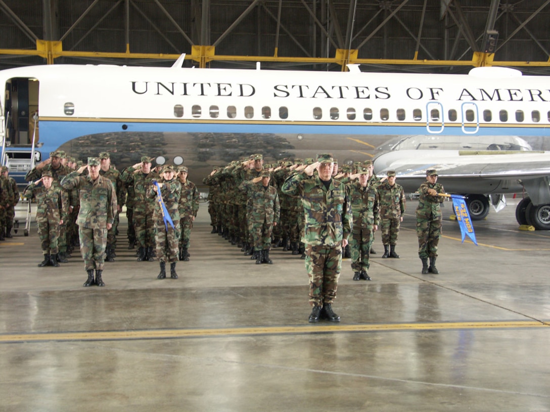 Members of the 932nd Airlift Wing are proud to serve.  The wing stands in formation awaiting the ceremony that changed wing command from Col. Donald Fletcher Jr., to Col. Maryanne Miller.  Photo by TSgt. Daniel Oliver, 932nd Airlift Wing.