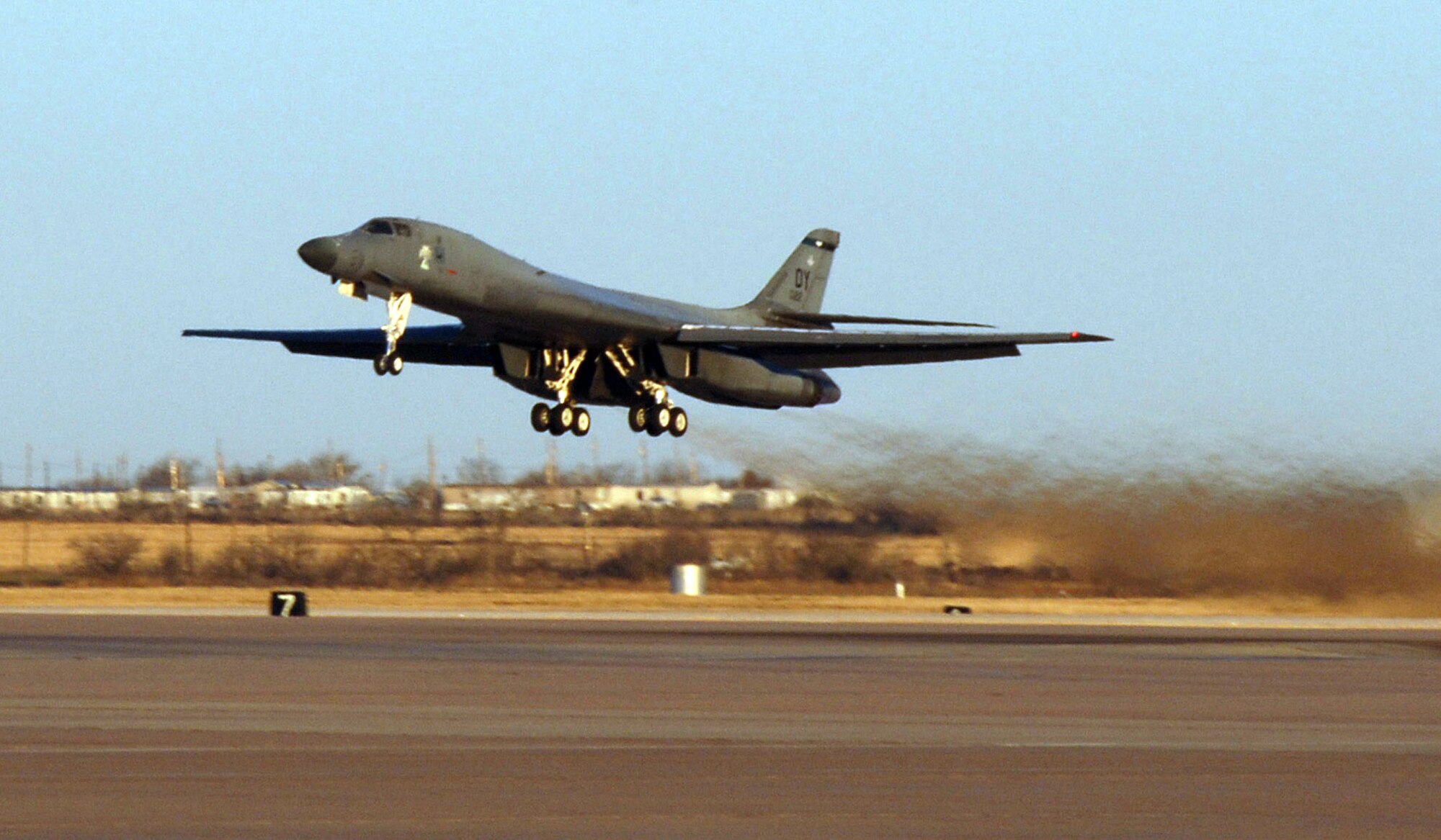 DYESS AIR FORCE BASE, Texas (AFPN) -- A B-1B Lancer takes off on a simulated deployment during the base’s operational readiness exercise. The aircraft is with the 9th Bomb Squadron here known as the “Bats.” The exercise prepares Airmen for the upcoming operational readiness inspection and wartime deployments. (U.S. Air Force photo by Staff Sgt. Araceli Alarcon)

