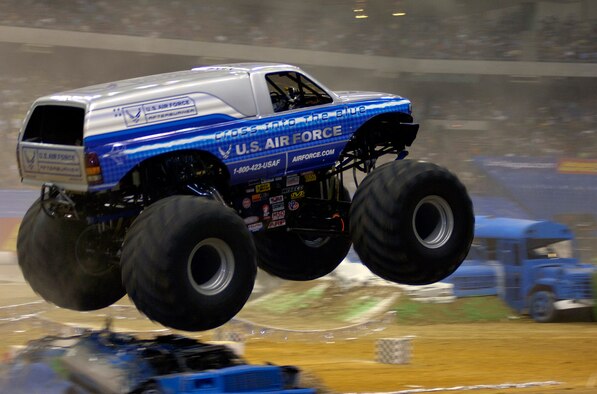SAN ANTONIO (AFPN) -- Afterburner, the Air Force's new monster truck, flies toward the finish line at the San Antonio Monster Jam. This is only the second race in which the truck, one of the newest Air Force recruiting tools, has competed. Afterburner, driven by Paul Cohen, made the finals Jan. 14, but was edged out by Grave Digger. (U.S. Air Force photo by Senior Airman Brian Ferguson)  