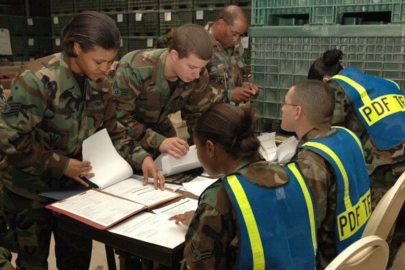 LANGLEY AIR FORCE BASE, Va. (AFPN) -- Airmen get a financial information briefing before their deployment here Jan. 13. (U.S. Air Force photo by Airman Vernon Young) 