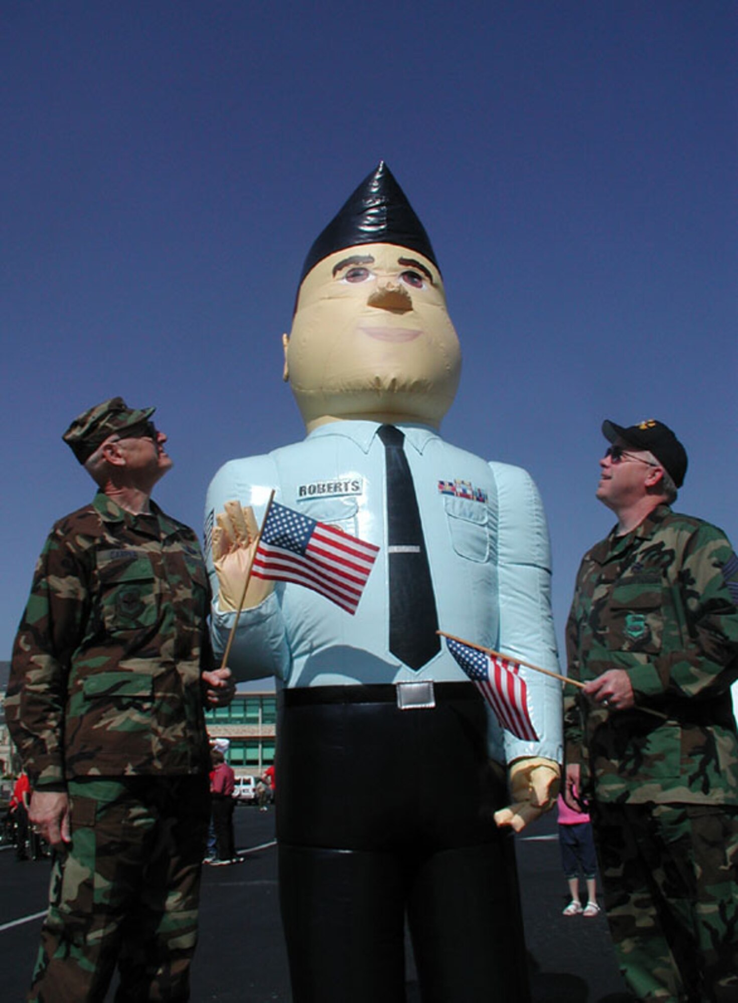 Who ranks highest?  The giant "recruiter" for the 932nd Airlift Wing stood head and shoulders above the rest of the Airmen at the Memorial Day parade.  To join the Air Force Reserve, call 1-800-257-1212.