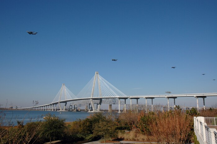 CHARLESTON AFB, SC--17 Massive C-17's fly over Charleston's newest landmark, the Arthur Ravenel Bridge, during a record breaking training mission. (Photo by 1Lt Wayne Capps, USAFR)
