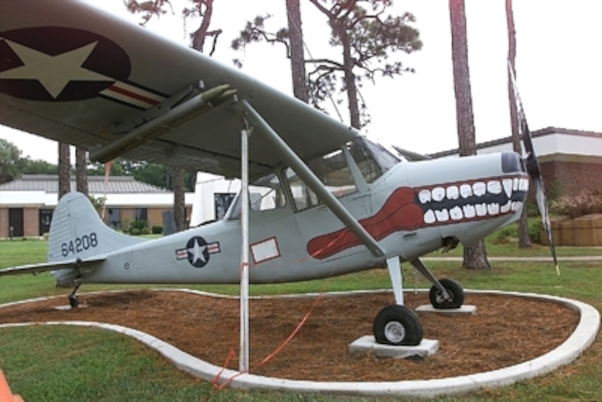 In 1950 Cessna won an Army design competition for a light, two-seat liaison and observation aircraft. They mated the wings and tail of one aircraft to a new fuselage with a large windowed "glasshouse" cabin and a 213 horsepower engine. The Army bought this L-19 Bird Dog which served in the Korean and Vietnam Wars.