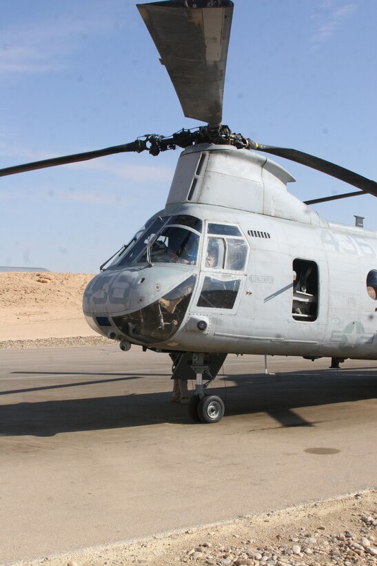 Brigadier Gen. R. David Papak, the commanding general of 4th Marine Aircraft Wing, and Lt. Col. Leo Kilgore, commanding officer of Marine Medium Helicopter Squadron 774, prepare for a mission, Jan. 19, at Al Asad, Iraq. Papak visited the Wild Goose, a reserve CH-46 squadron, in order to spend time with the Marines and Sailors.