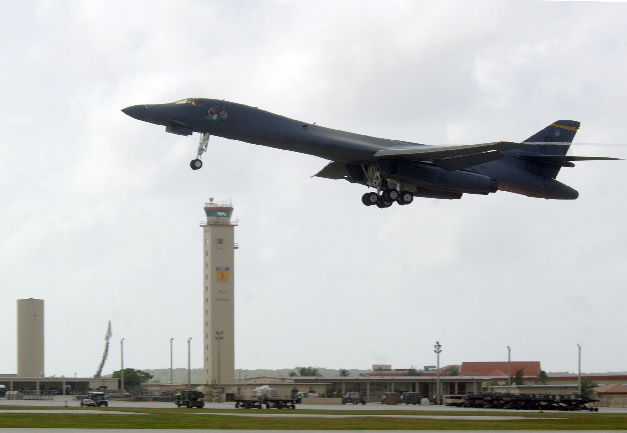 ANDERSEN AIR FORCE BASE, Guam (AFPN) -- A B-1B Lancer takes off from here during an air expeditionary force deployment mission. The aircraft belongs to the 34th Bomb Squadron at Ellsworth Air Force Base, S.D. The unit is here to provide the U.S. Pacific Command a continuous bomber presence in the Asia-Pacific region. (U.S. Air Force photo by Master Sgt. Val Gempis)