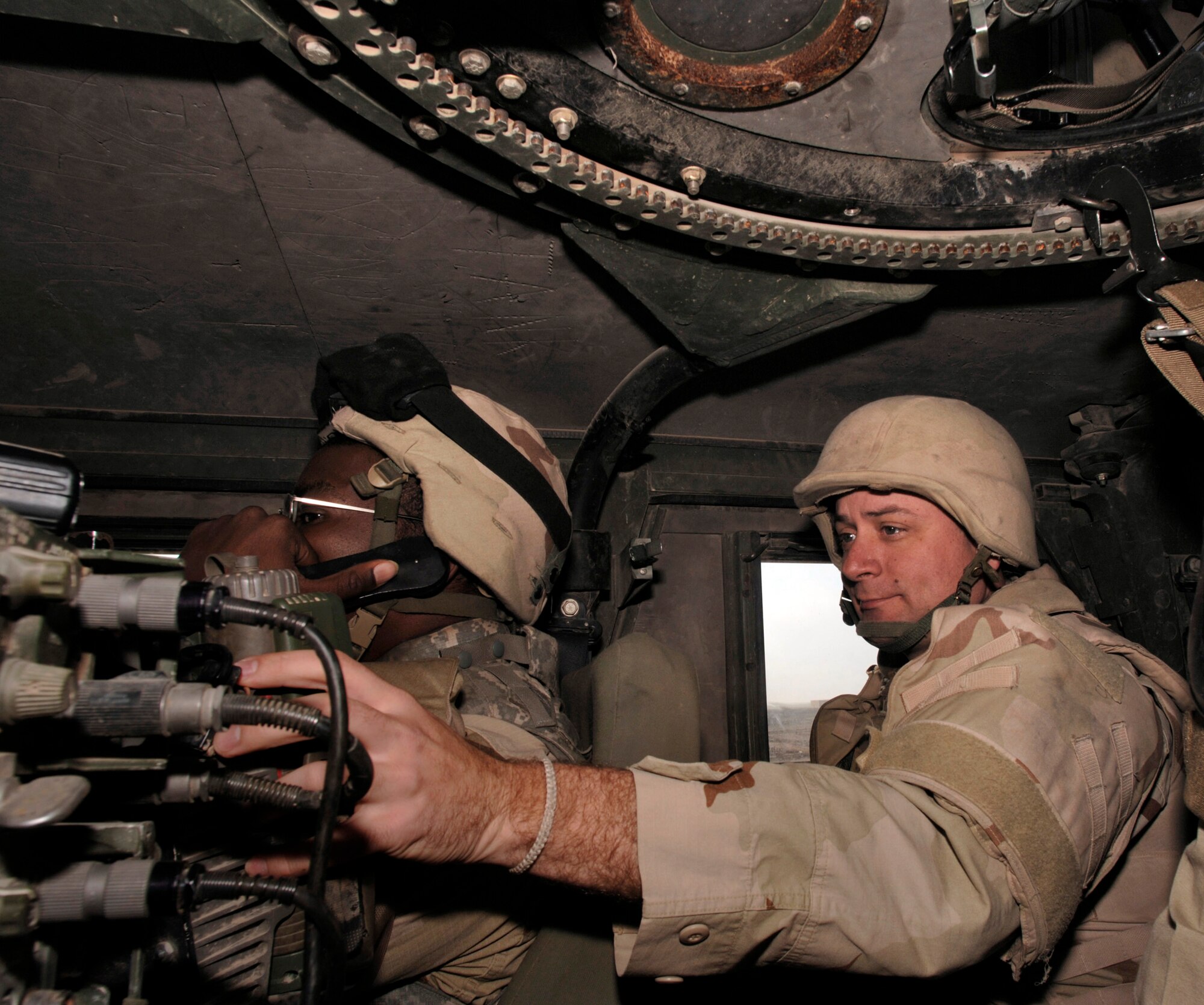 IRAQ (AFPN) -- Tech. Sgt. Andrew Morin brings up position data on the Precision Lightweight GPS Receiver, a global positioning satellite device. He is with the 732nd Expeditionary Logistics Readiness Squadron participating in combat convoy security team missions.  His team is returning convoy duty to the Army. (U.S. Air Force photo by Master Sgt. Lance Cheung) 