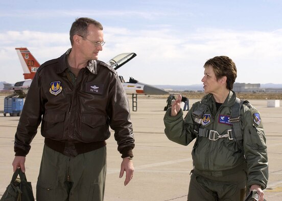 Lieutenant Gen. Terry Gabreski (right), Air Force Materiel Command vice commander, and Lt. Col. Dale Parsons, U.S. Air Force Test Pilot School director of special courses, discuss the general's F-16 mission during a Test Pilot School Senior Executive Short Course held Jan. 9 through 12 at Edwards Air Force Base, Calif. (Air Force photo by Chad Bellay)


