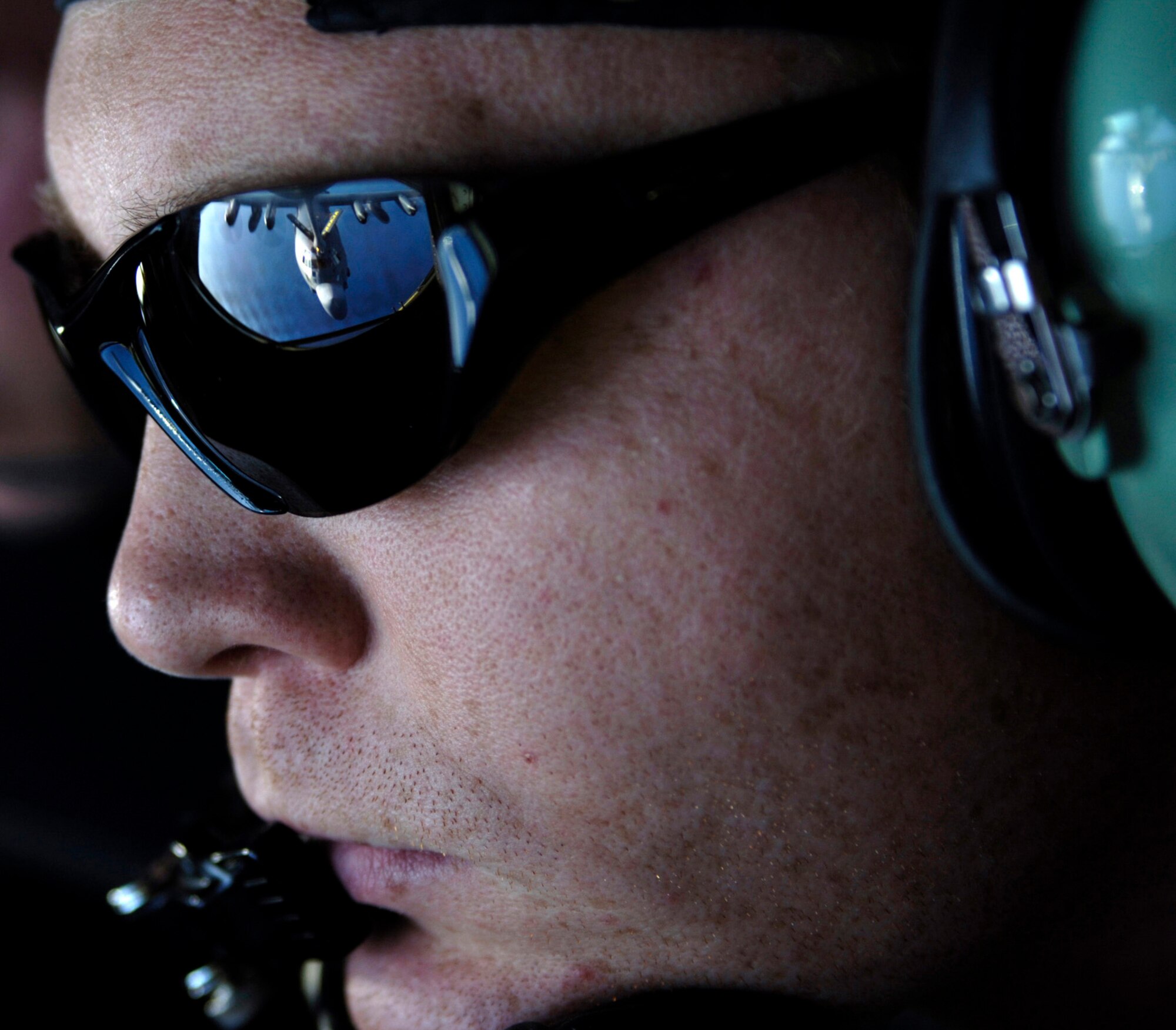 ANDERSEN AIR FORCE BASE, Guam (AFPN) -- Staff Sgt. Jeremy Vancil refuels an MC-130 Combat Talon during a refueling mission over the Pacific Ocean. Sergeant Vancil is from the 168th Air Refueling Squadron, Alaska Air National Guard. The 168th is deployed to Andersen as part of the Air and Space Expeditionary Force rotations and is supporting all U.S. aircraft in the Pacific. (U.S. Air Force photo by Tech. Sgt. Shane A. Cuomo)