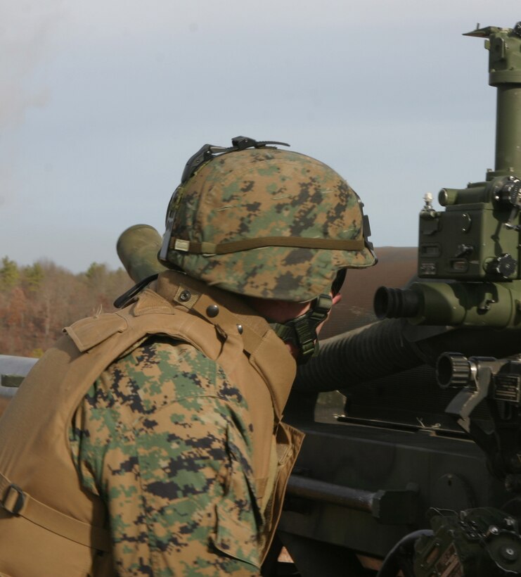 Marines from Sierra Battery, Battalion Landing Team 1st Bn., 8th Marines prep and fire an M198 Medium Howitzer (Towed) at a close range target at Fort A.P. Hill Va., during a direct fire exercise. This is training that is nearly impossible to conduct at Camp Lejuene, N.C. due to space constraints but is easily accommodated here. These Marines will be deploying with the 24th Marine Expeditionary Unit after they complete their pre-deployment training packages.