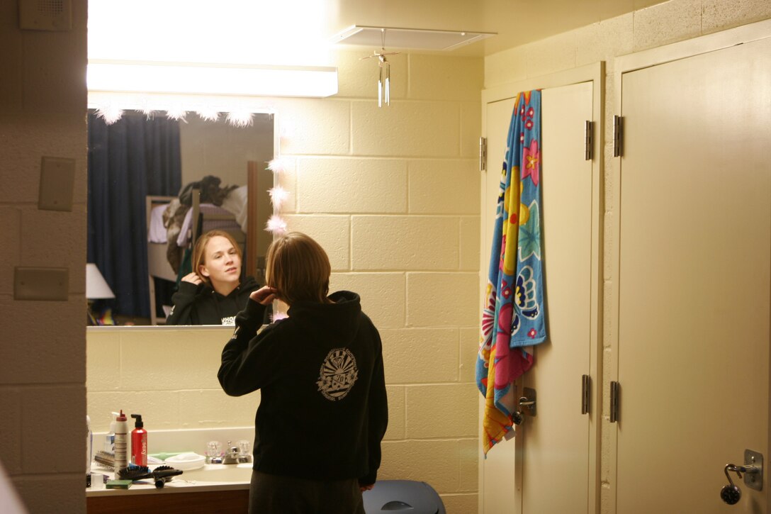 MARINE CORPS BASE CAMP LEJEUNE, N.C.--Lance Cpl. Amy Brewer, a clerk for the II MEF G-2 and native of Lexington, Ky., was selected to participate in a recent survey conducted by the U.S. Census Bureau.  Brewer, like many single Marines, lives in a barracks room, which generally has 3 beds, 3 closets, and a single bathroom, sink, and mirror.