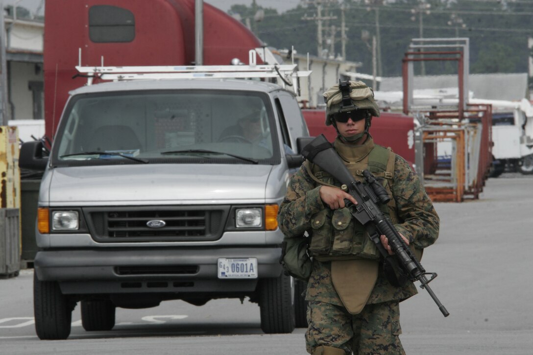 MARINE CORPS BASE CAMP LEJEUNE, N.C. (October 10, 2006) ? A Marine from Company I, 3rd Battalion, 6th Marine Regiment patrols the industrial area here. The Marines were conducting a training exercise in preparation for their upcoming deployment to Iraq.