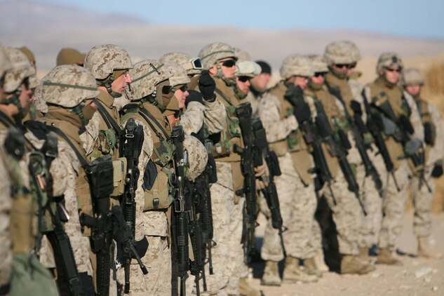 Marines from 3rd Battalion, 8th Marine Regiment closely pay attention to a class on Enhanced Marksmanship Training. 3rd Bn., 8th Marines are conducting their Mojave Viper exercise at Twentynine Palms Calif. the unit will deploy in support of Operation Iraqi Freedom in March.