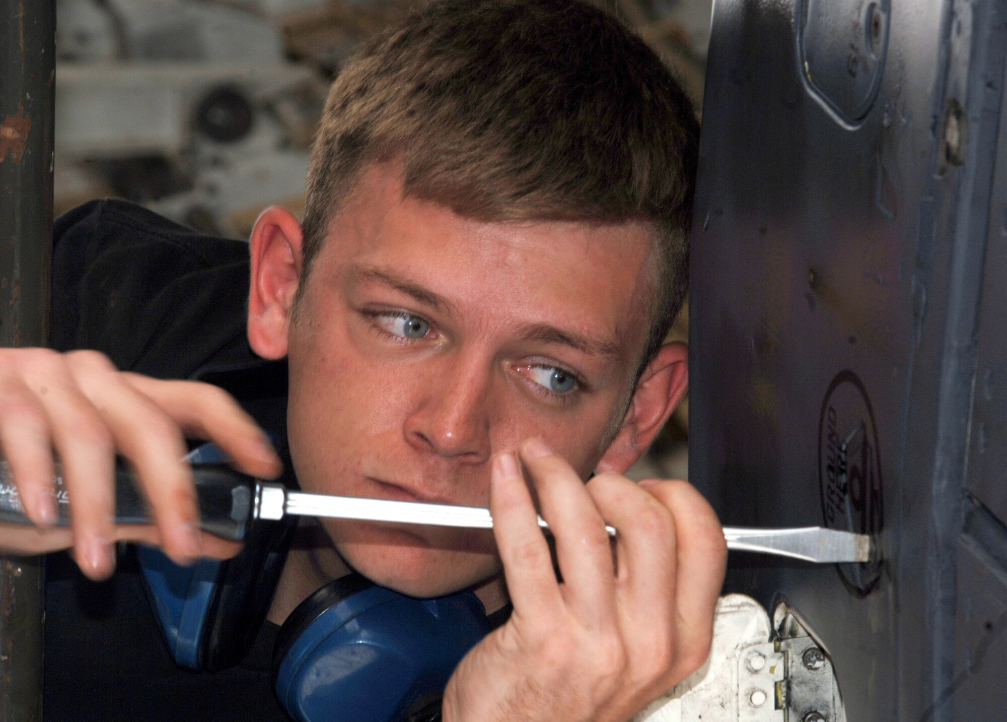 ANDERSEN AIR FORCE BASE, Guam (AFPN) -- Senior Airman Terrance Lesko inspects the rotary launcher drive of a B-1B Lancer during his deployment here. Airman Lesko is a weapons specialist from the 28th Aircraft Maintenance Squadron at Ellsworth Air Force Base, S.D. (U.S. Air Force photo by Master Sgt. Val Gempis)