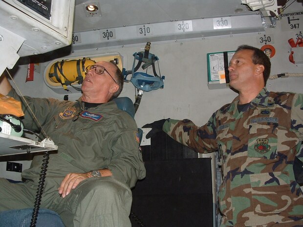 Charleston AFB, SC -  MSgt Darryl Brown, a reserve C-17 loadmaster with the 701st AS, 315th Airlift Wing, explains panel details to MSgt Joey Clark 81st APS.  MSgt Clark is a former C-141 loadmaster who cross trained into the aerial port career field as the C-141s were phased out. (photo by Chief Master Sgt. Charlie Hall, USAFR)