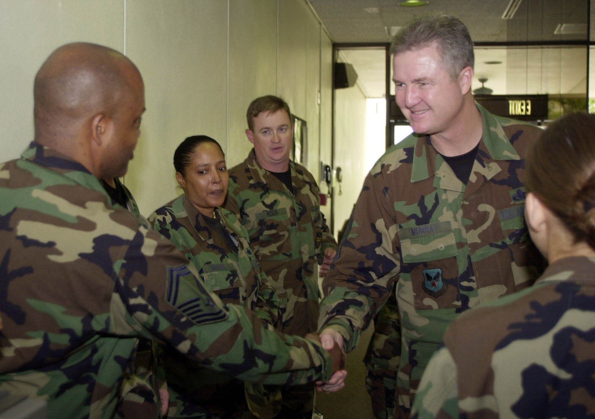 MIAMI (AFPN) -- Chief Master Sgt. of the Air Force Gerald R. Murray greets Airmen during his visit to U.S. Southern Command headquarters here Jan. 19. Chief Murray made numerous stops to visit Airmen in the SOUTHCOM area of operations, which included Honduras, Ecuador, Columbia, Curacao Netherland Antilles and the Miami area Jan. 16 to 19. (U.S. Air Force photo by Master Sgt. Barb Lavigne) 