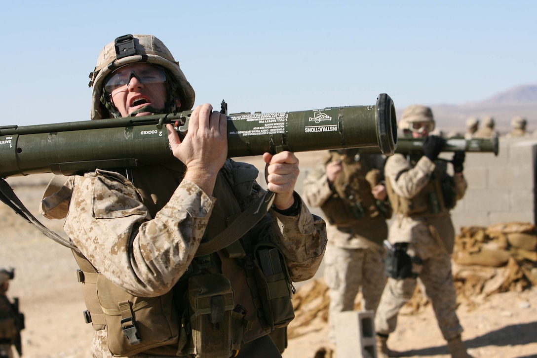 Maj. William F. Wahle, Military Transistion Team leader for 3rd Battalion, 8th Marine Regiment calls out "back blast area all secure," during an AT4 simulated fire exercise on range 104 at Marine Corps Air Ground Comabat Cenert Twentynine Palms. The goal of MTT is to train and mentor the Iraqi Security Forces.