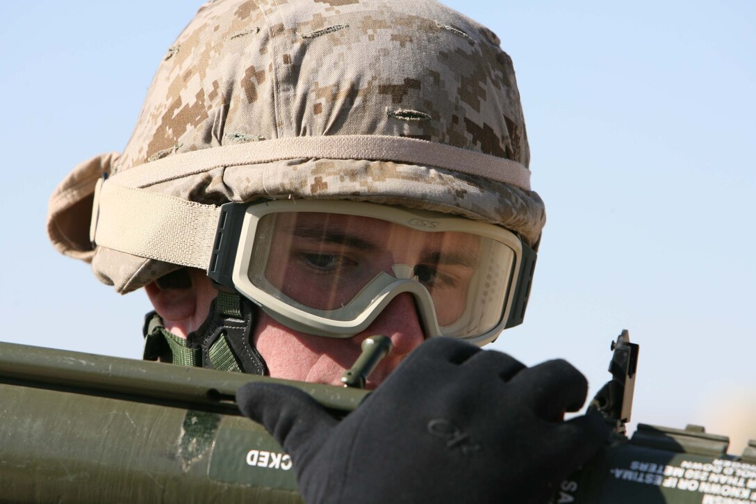 Sgt. Daniel R. Liscinsky, a 22-year-old fron Milford, C.T. and Intelligence Speciallist for 3rd Battalion, 8th Marine Regiment's Military Transistion Team gets ready to fire his weapon during an AT4 simulated fire exercise on range 104 at Marine Corps Air Ground Comabat Cenert Twentynine Palms. The goal of MTT is to train and mentor the Iraqi Security Forces.
