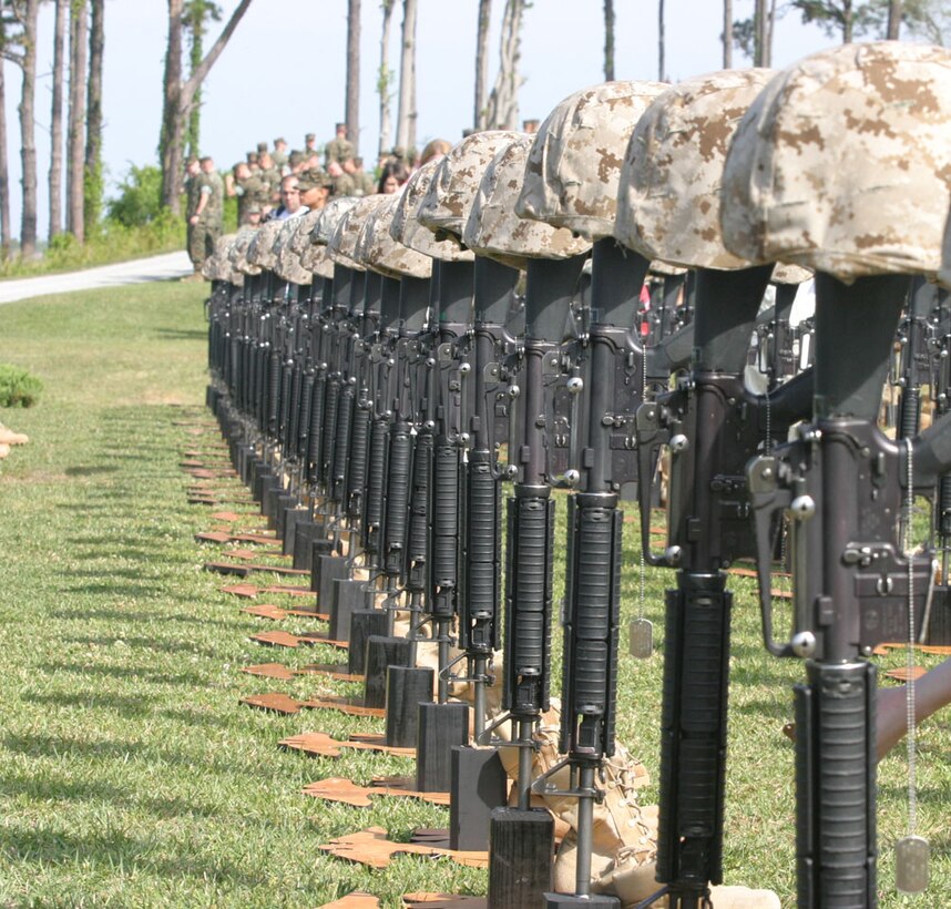 MARINE CORPS BASE CAMP LEJEUNE, N.C. (April 21, 2006)- Marines with 2nd Marine Division paid their respects to the Marines killed in action in support of Operation Iraqi Freedom. The division conducted combat operations in the Al Anbar province from February 2005 to February 2006. 265 Marines, sailors and soldiers were honored during the ceremony. (Official U.S. Marine Corps photo by Cpl. Lucian Friel (RELEASED)