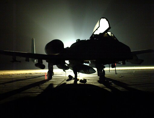 An A-10 from the 442nd Fighter Wing, an Air Force Reserve unit based at Whiteman Air Force Base, Mo., rests over night on the ramp at Barnes Air National Guard Base, Mass., on its way to participate in Operation Iraqi Freedom in 2003.  (Photo by Master Sgt. Bill Huntington)