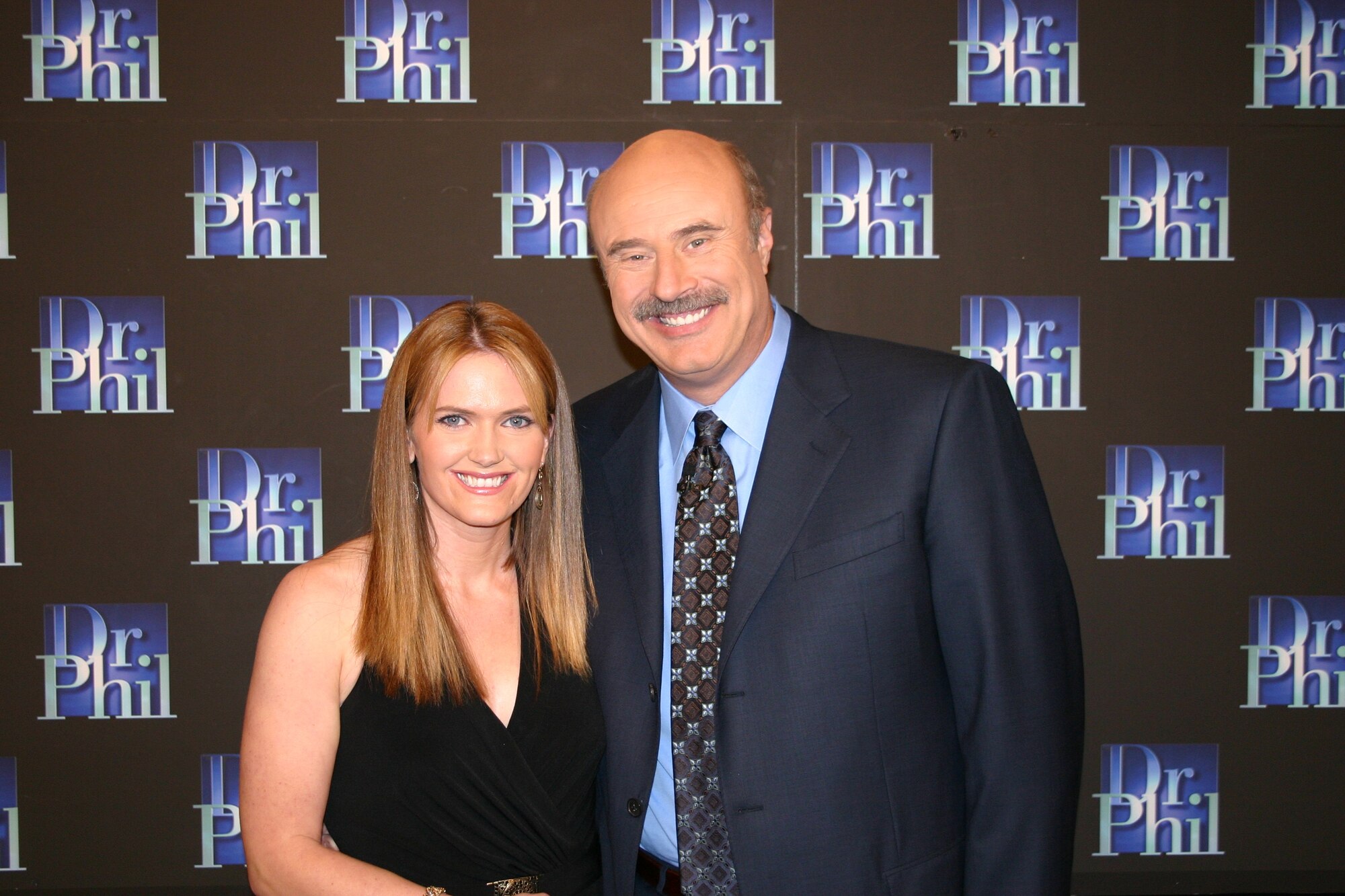 Kristine Bailey poses with Phillip C. McGraw, better known as Dr. Phil, after appearing on his show, which featured guests who had succeeded in losing weight.  (Courtesy photo of Peteski Prod. Inc. and CBS Paramount Domestic TV -- Mathew Imaging)
