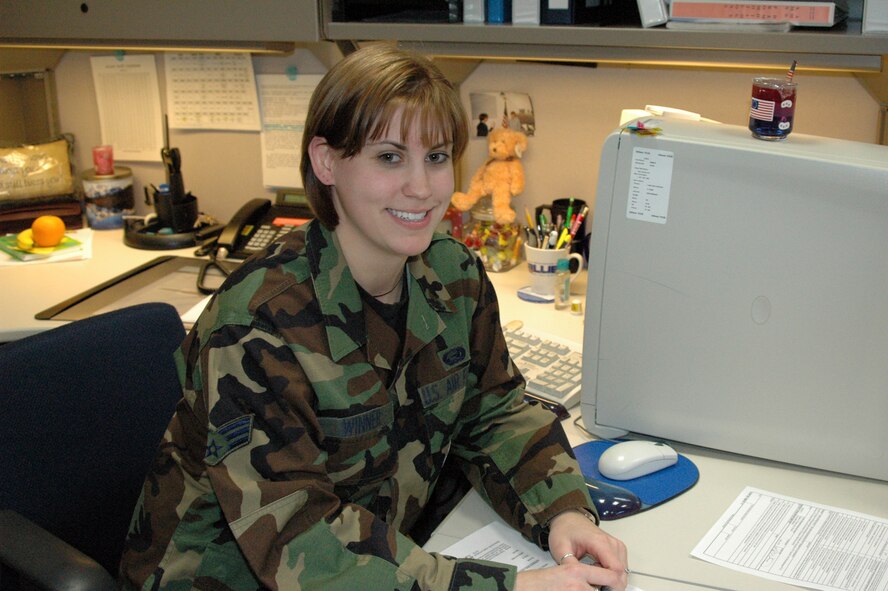 Senior Airman Kathy A. Winner, a personnel technician assigned to Air Force Reserve Command's 910th Airlift Wing Military Personnel Flight, was selected as the 2005 Airman of the Year for the 910th Airlift Wing.  U.S. Air Force Photo by Tech. Sgt. Shawn David McCowan.