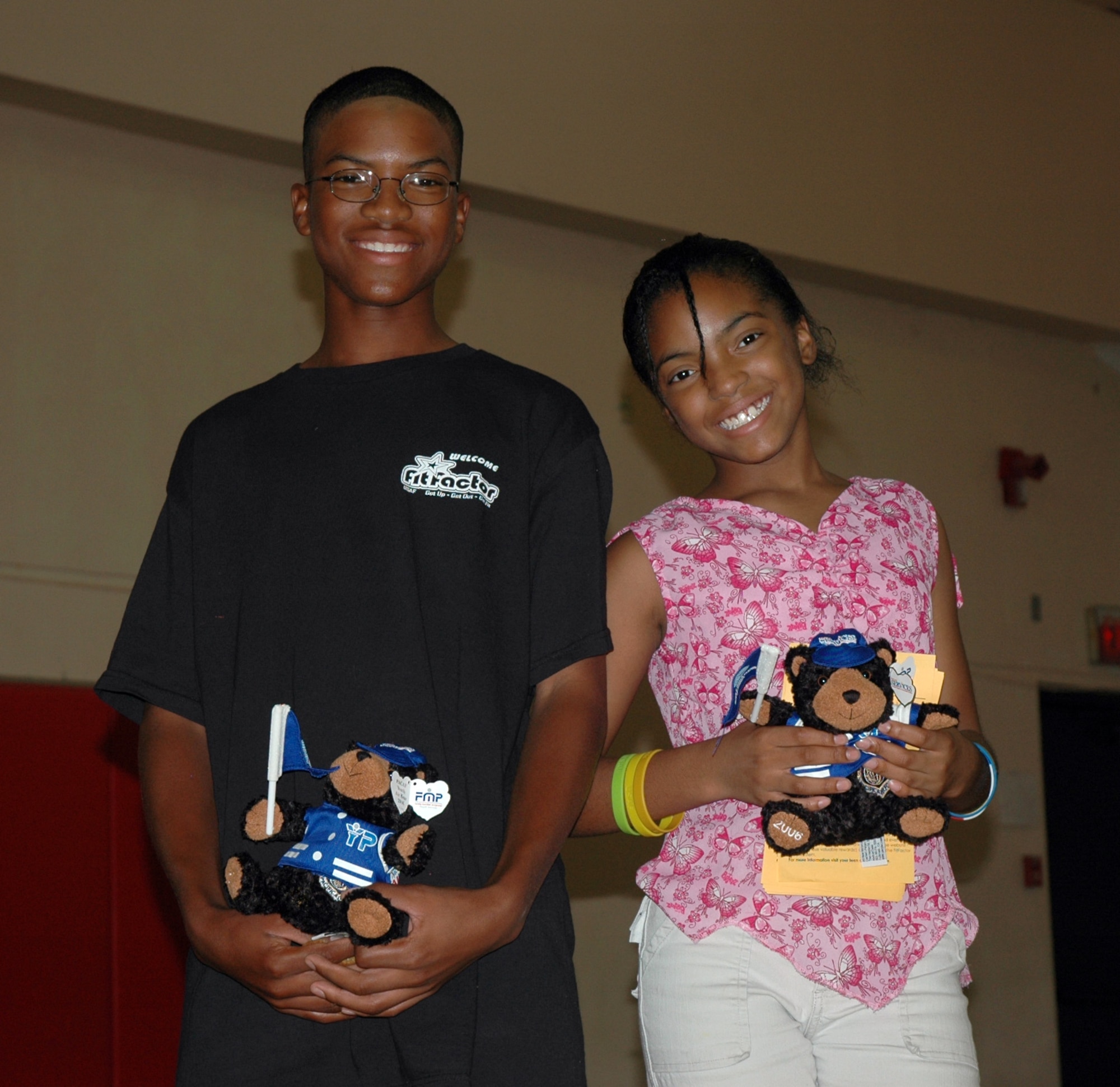 ANDERSEN AIR FORCE BASE, Guam (AFPN) -- Fenton and Cierra Fitzgerald earned the maximum allowable daily points here for the FitFactor program by doing various activities on a daily basis. They included walking, running, basketball and playing instruments. (U.S. Air Force photo)