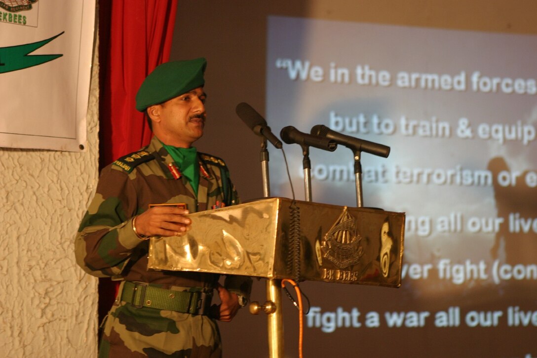 BELGAUM, India (Oct. 26, 2006) -- Col. Vijay B. Nair, commanding officer of India army's 21st Battalion, The Punjab Regiment, gives his opening address to Marines with Echo Co., Battalion Landing Team 2/4, and soldiers with the India army's Alpha Co., 21st Battalion, The Punjab Regiment, at the Junior Leaders building. Marines of Echo Co. are participating in Exercise Shatrujeet 06, which began 25 October 2006 where they are currently training with the Indian Army in basic infantry tactics. The 15th Marine Expeditionary Unit (Special Operations Capable), part of the Boxer Expeditionary Strike Group aboard the USS Boxer (LHD 4), USS Dubuque (LPD 8) and the USS Comstock (LSD 45), is currently deployed in the Western Pacific region.