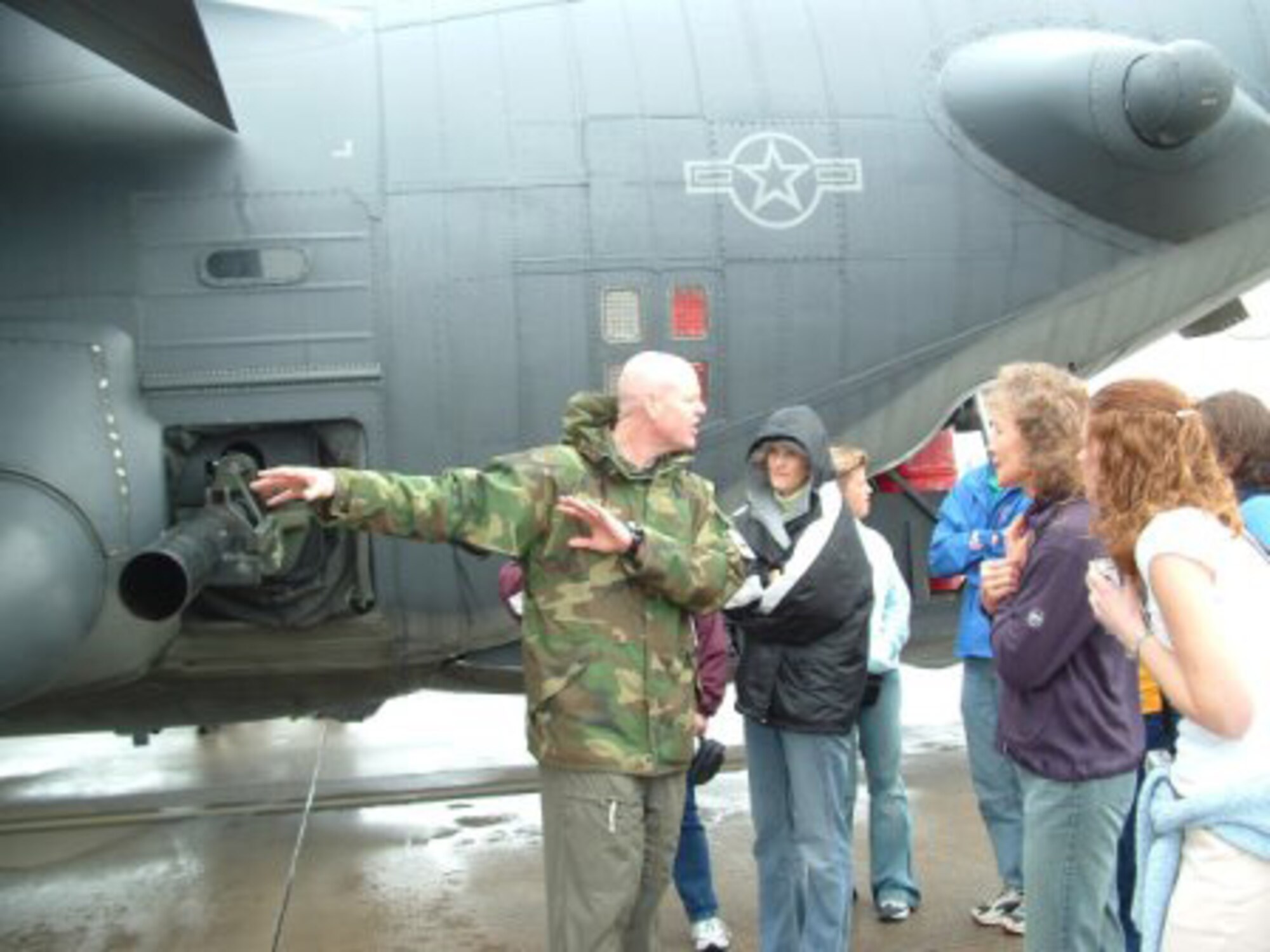 Lt. Col. Ted Fordyce, 16th Special Operations Squadron director of operations, explains the capabilites of the AC-130H Spectre Gunship to the teachers.