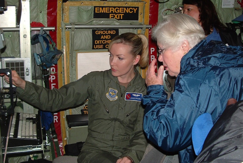 1st. Lt. Nicole Mitchell, 403rd Wing, shows local teachers WC-130J weather tracking equipment, (U.S. Air Force photo by Amy Oliver)