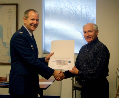 On Jan. 13, Col. David H. Wuest, 512th Airlift Wing vice commander, presented Mr. William K. Brandon, Regional Manager Kent County Probation and Parole, with the Employer Support of the Guard and Reserve "Patriot Award" Certificate of Appreciation.  Capt. Shirley Whitney, 709th Airlift Squadron executive officer, nominated Mr. Brandon for the ESGR award for his continued support while she's been activated supporting the global war on terror.