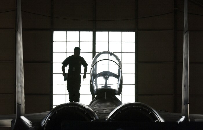 NELLIS AIR FORCE BASE, Nev. -- Senior Airman Jordan Lewis performs a post-weapons load inspection here Jan. 26 on an F-15 Eagle. Airman Lewis is a weapons loader with the 57th Aircraft Maintenance Squadron.  (U.S. Air Force photo by Master Sgt. Kevin J. Gruenwald)