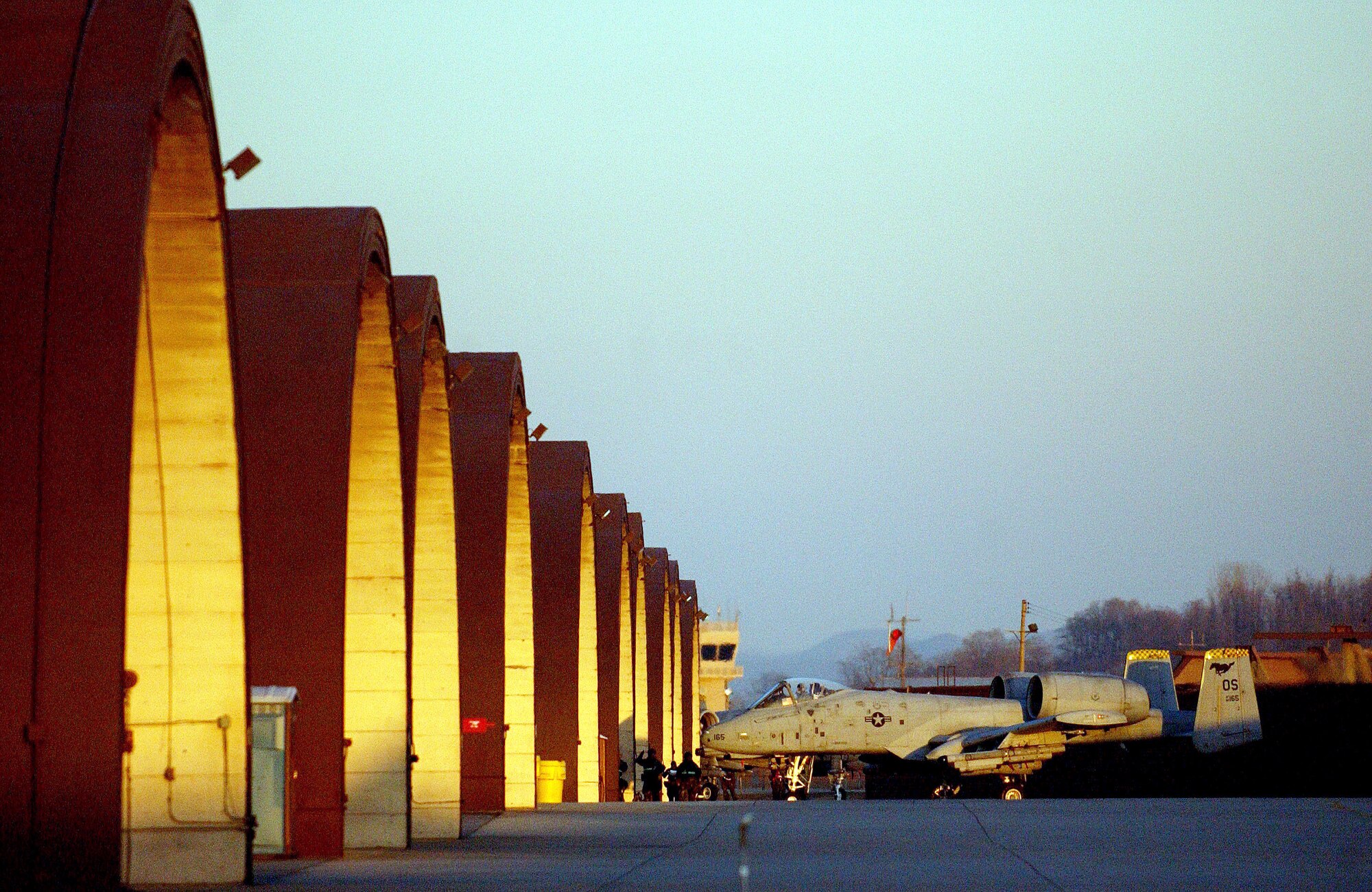 OSAN AIR BASE, South Korea (AFPN) -- An A-10 Thunderbolt II returns after flying a training mission supporting exercise Beverly Bulldog 06-01 here Jan. 24. Exercise scenarios test the base's ability to protect its operations from missile attacks or enemy forces. (U.S. Air Force photo by Tech. Sgt. Jeffrey Allen)


