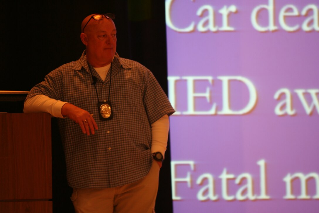 Ralph E. Morten, a member of the L.A.P.D. Bomb Squad and a former Marine, instructs Marines on improvised explosive devices, suicide bombers and vehicle bombs at the base theater in Camp Pendleton Calif., Jan. 27. The one day training also included a instruction on survival techniques and a video presentation starring retired Gunnery Sgt. R. Lee Ermey.