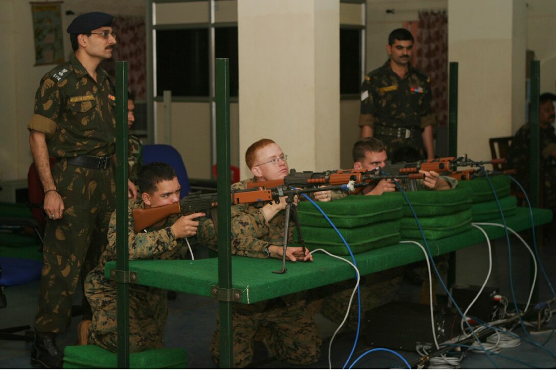 BELGAUM, India (Oct. 29, 2006)--Marines with 1st Platoon, Echo Co., Battalion Landing Team 2/4, run through various training scenarios on the Advanced Infantry Weapon Training Simulator at the Lico Training Area here. Marines of Echo Co. are participating in Exercise Shatrujeet 06, which began 25 October 2006 where they are currently training with the Indian Army in basic infantry tactics. The 15th Marine Expeditionary Unit (Special Operations Capable), part of the Boxer Expeditionary Strike Group aboard the USS Boxer (LHD 4), USS Dubuque (LPD 8) and the USS Comstock (LSD 45), is currently deployed in the Western Pacific region.