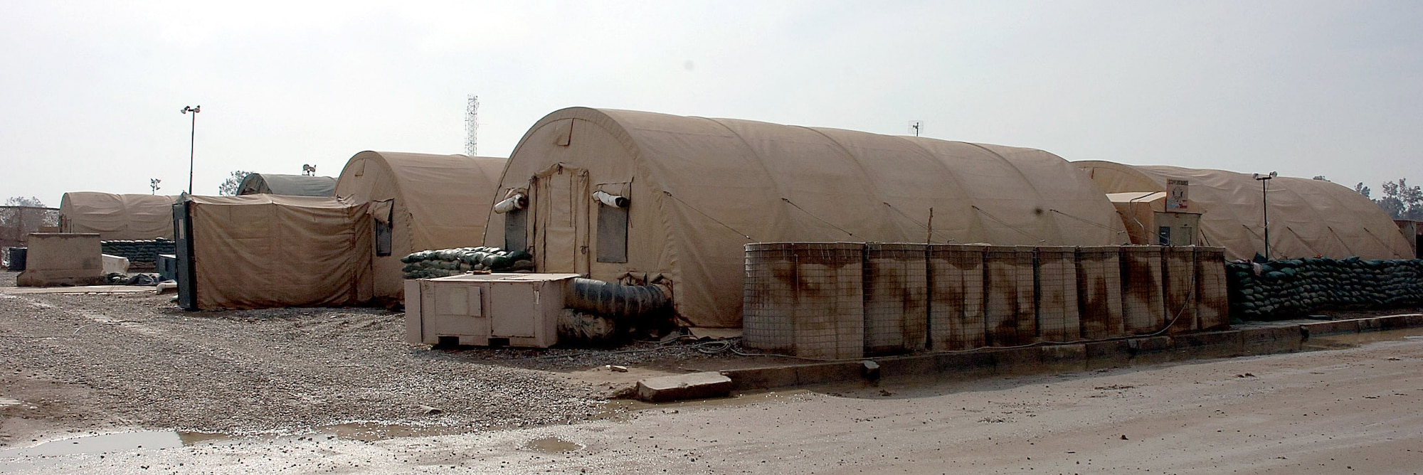 SATHER AIR BASE, Iraq (AFPN) -- The 447th Expeditionary Medical Squadron recently moved from old temper tents to a new 15,000-square foot modular clinic at Sather Air Base, Baghdad International Air Base, Iraq. The new clinic more than doubles the space available to the deployed medical team that provides primary and emergent medical care to Airmen at the air base and also to Department of Defense contractors, U.S. Army and Marines and Iraqi military forces based at the sprawling Victory Base Complex located at BIAP. (U.S. Air Force photo by Master Sgt. Will Ackerman)