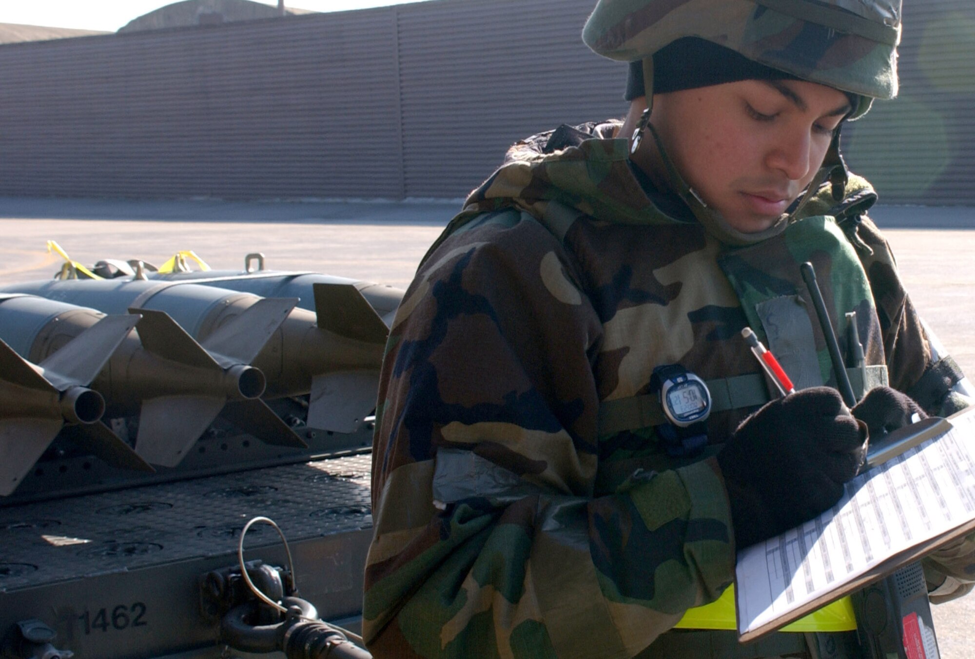 OSAN AIR BASE, South Korea (AFPN) -- Senior Airman Josue Mendo inventories practice bombs before they are loaded onto an A-10 Thunderbolt II during an exercise here Jan. 23. The Peninsula Combat Employment Readiness Exercise, or PENCERE, scenarios tested Osan's ability to protect its operations from missile attacks, and the insertion of thousands of enemy special operations forces looking to disrupt operations. Airman Mendo is with the 51st Munitions Squadron. (U.S. Air Force photo by Airman 1st Class Melinda Peachof)