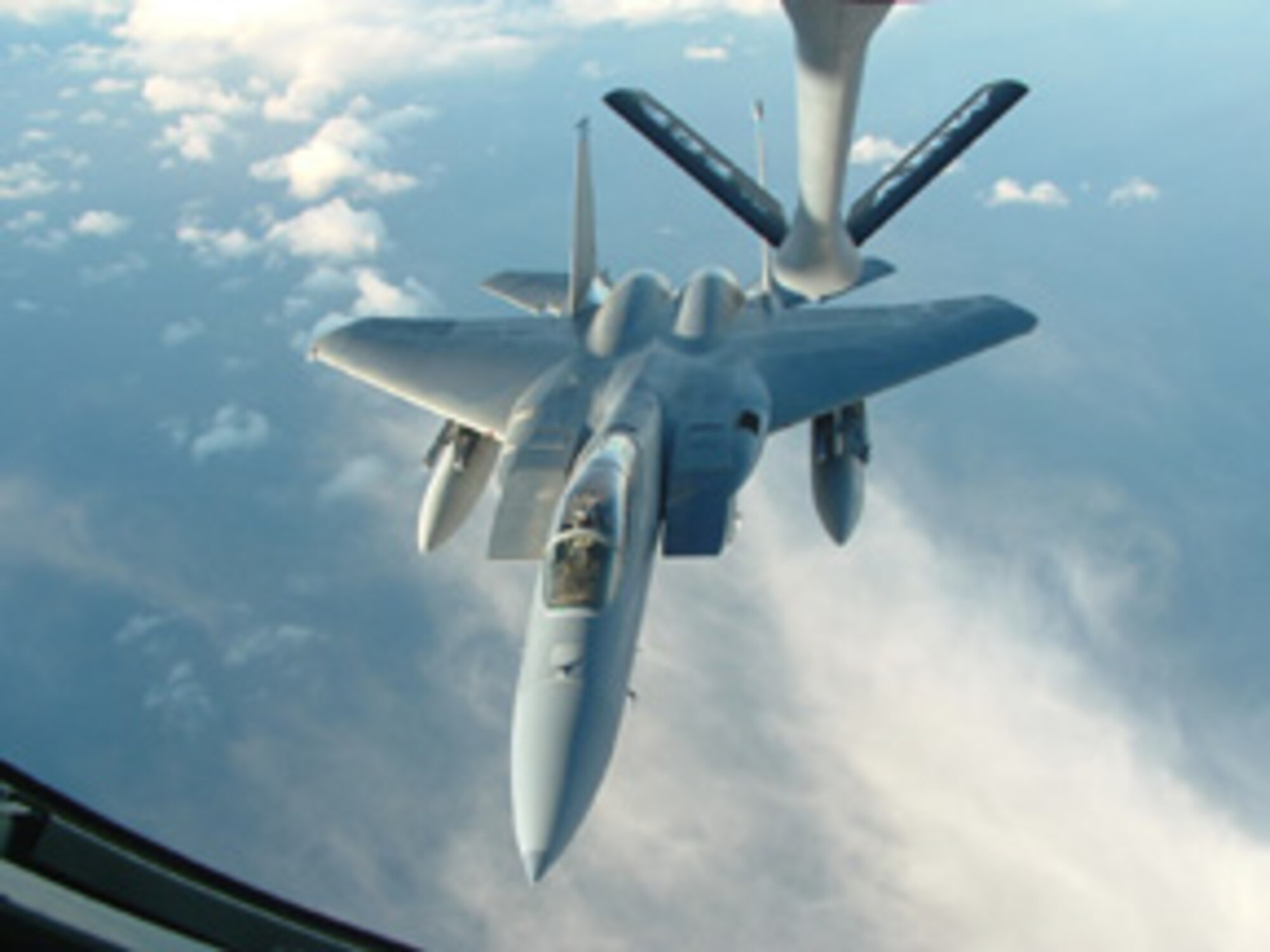 Grissom Air Reserve Base, Ind ---The boom from a KC-135R Stratotanker from the 434th Air Refueling Wing lowers into position to provide fuel to an F-15 fighter. Aircraft from the 434th ARW were in Iceland to provide support to an Air Expeditionary Force.  (Photo by Staff Sgt. Deborah L. Melton)