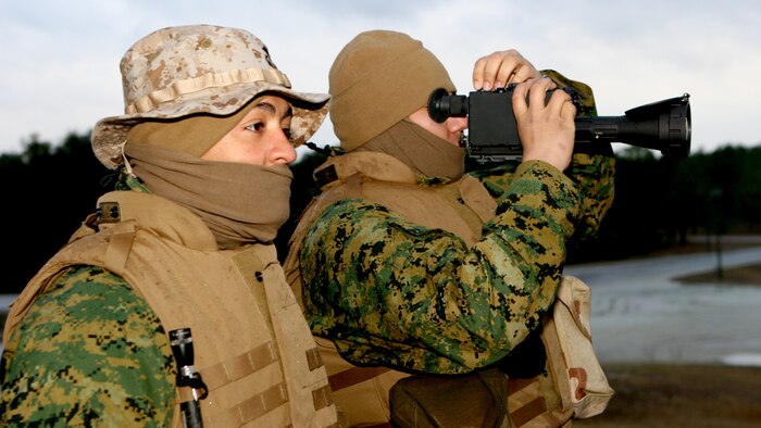 Washington, D.C.-General Michael W. Hagee, the 33rd commandant of the Marine Corps, stands amongst a detachment of Marines and Sailors of the Chemical Biological Incident Response Force (CBIRF) in the U.S. Capitol a few hours before President George W. Bush delivered the State of the Union Address.  The Force was mobilized to deter or reduce the effects of a chemical or biological threat, accidental or terrorist, on the Capitol Hill campus during the historical speech.  During his speech to the country, President Bush acknowledged the fearless nature of servicemembers.  "Our men and women in uniform are making sacrifices--and showing a sense of duty stronger than all fear," said Bush.