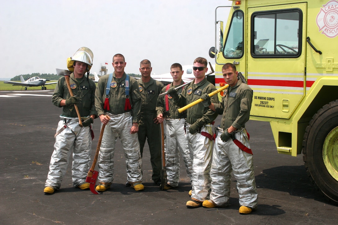 Matthew R. Cifaldi, Cpl. Michael B. Singer, Staff Sgt. Larry D. Horn, and lance corporals Anthony C. Welsh, Grant J. Wurm and Trey M. Mouch ? part of the CFR team that safeguarded Beaufort airport operations during the July 4 week event.