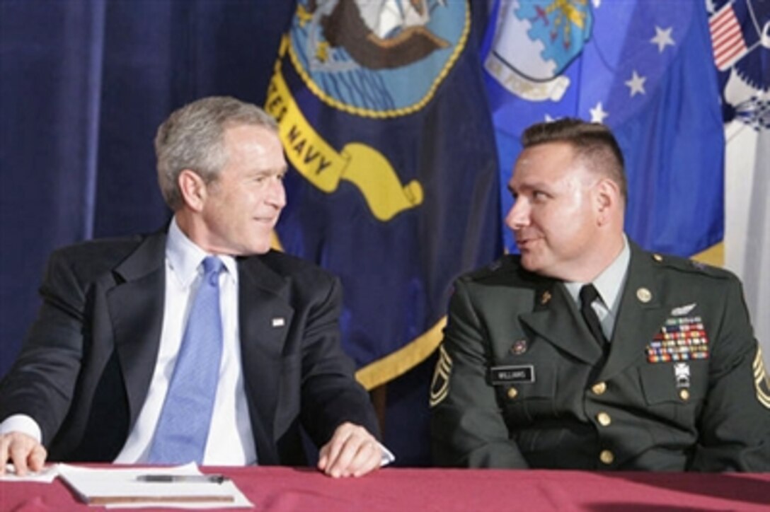 Australian Minister of Defense Brendan Nelson and U.S. Defense Secretary Donald H. Rumsfeld answer questions from the media during a press conference in the Pentagon, June 28, 2006.