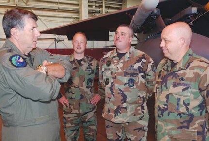 Gen. Paul V. Hester, Pacifi c Air Forces commander, talks with Master Sgt. Daniel Hoxie, Tech. Sgt. Larry Walker, and Master Sgt. Ray Eldridge, 3rd Aircraft Maintenance Squadron, during a PACAF Civic Leader Tour visit. Civic Leader Tours are designed to give local civic leaders a better understanding of what the Air Force does and the unique missions of various bases. The visit to Elmendorf gave the PACAF Civic Leaders a chance to learn more about the 3rd Wing mission.