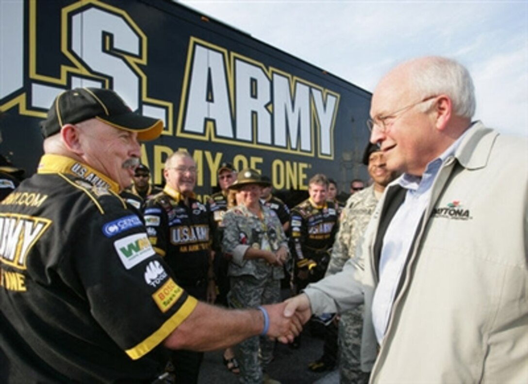 Vice President Dick Cheney meets members of the U.S. Army NASCAR racing team July 1, 2006, while attending the 2006 Pepsi 400 NASCAR race at Daytona International Speedway in Daytona, Fla. 