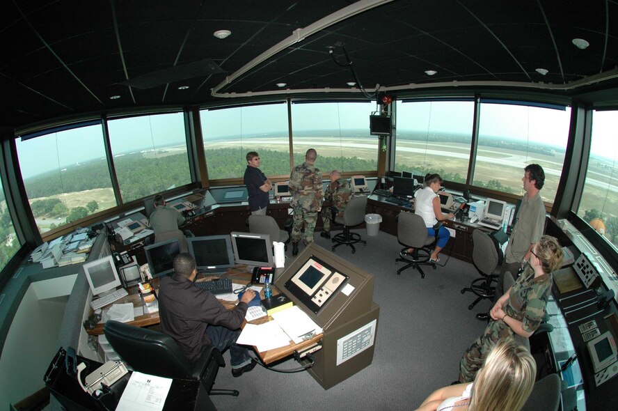 EGLIN AIR FORCE BASE, Fla. — Air traffic controllers direct oncoming aircraft at the Eglin tower. The control tower is one of three areas of responsibility for the Airfield Operations Flight. (Air Force photo by Miranda Rimes)

