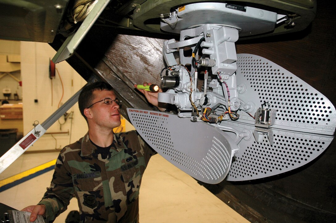 908th Maintenance Group's Senior Airman Brandon Ballenger inspects the weather radar on a 908th Airlift Wing C-130.  C-130s at the Maxwell AFB, Ala.,  unit will upgrade to color radar next fall. (Photo by Lt. Col. Jerry Lobb, 908th AW Public Affairs, Maxwell AFB, Ala.)
Created April 13, 2006 by JWL